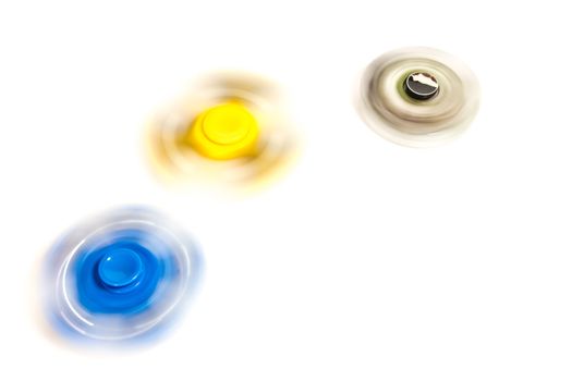 fidget hand spinner spinning on white background