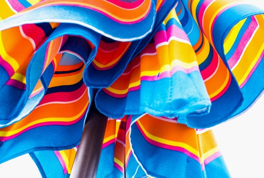 Vivid blue and orange color of beach umbrella