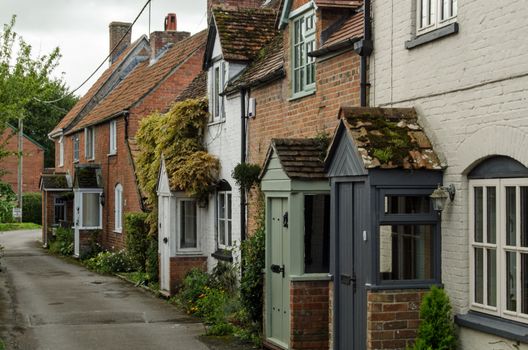 Row of traditional cottages in the village of Market Lavington in Wiltshire, England.  