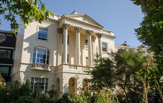 THe elegant Regency facade of the Royal College of Physicians headquarters overlooking Regent's Park in central London.