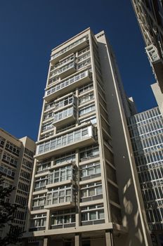 Tower in the Erno Goldfinger designed office turned apartment block now known as Metro Central Heights in the Elephant and Castle district of London. Sunny, summer day.