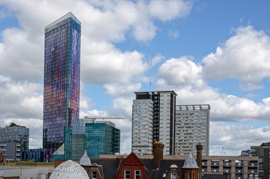 View from a high building in central Croydon looking East towards the landmark Saffron Tower with its bright cladding.  