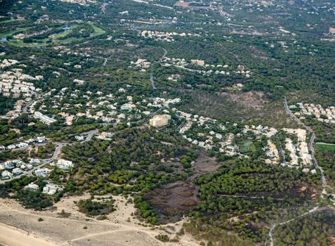 Aerial view of the Quarteira district of Faro with the 5 star Ria Park Hotel and Spa in the middle of the shot. 