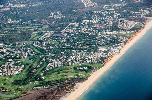 Aerial view of part of the Algarve Coast in Faro, Portugal.  Includes luxury 5 star hotels, golf courses and the Praia de Vale do Lobo beach.