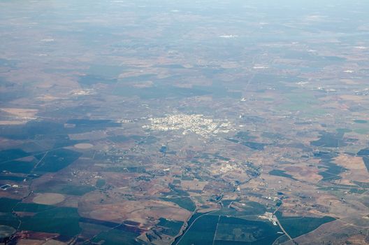Aerial view of the city of Beja in the Alentejo region of Portugal.  The historic city is surrounded by farmland and dates back hundreds of years. 
