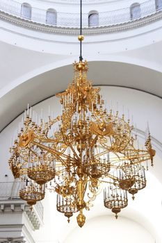 Chandelier in the center of the hall of Trinity Izmailovsky Cathedral. Cathedral of the Holy Life-Giving Trinity of the Life Guards Izmailovsky Regiment. Saint-Petersburg.