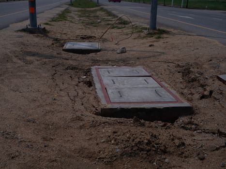 drain catch basin concrete over grass lawn in park