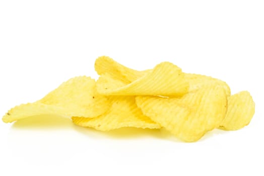 Group of crispy potato chips in close-up isolated on a white background.