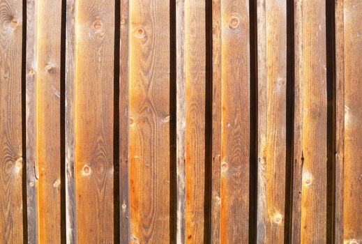 Decorative panel from wooden boards on a house wall