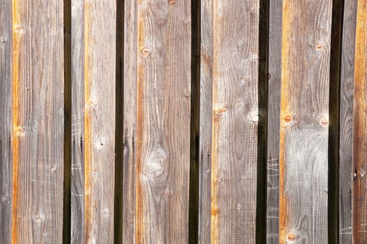 Decorative panel from wooden boards on a house wall