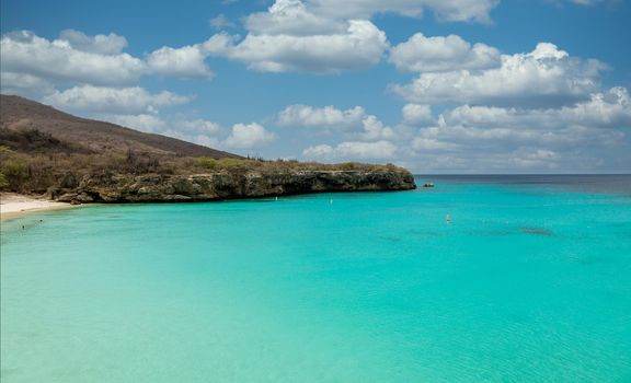 Clear aqua water off the rocky coast of Curacao