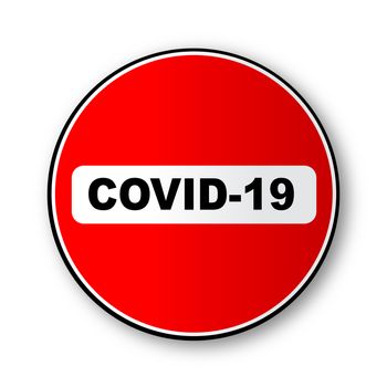 A large round red traffic no entry sign with text Covid-19