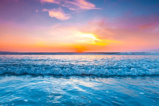 Amazing sunset from Bali Double Six beach surf waves and colorful clouds