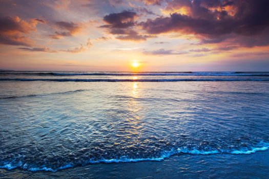 Amazing sunset from Bali Double Six beach surf waves and colorful clouds