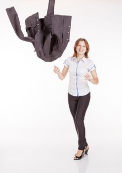 young smiling businesswoman throwing up her jacket