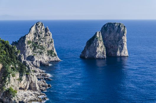 The Mediterranean sea on the Italian coast bathing the cliff of the island of Capri.