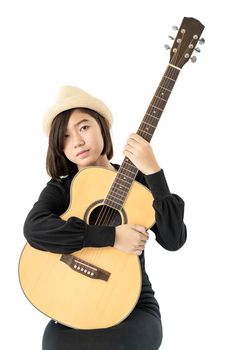 Young asia woman hold guitar guitar folk song in her hand isolate on white background