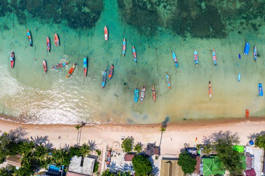 Aerial view of Long tail boats on the sea at Koh Tao island, Thailand.