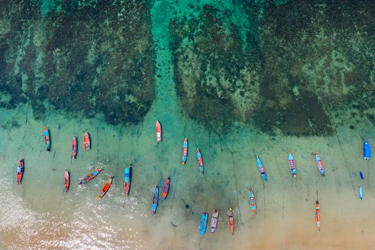 Aerial view of Long tail boats on the sea at Koh Tao island, Thailand.