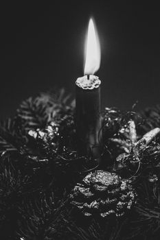 beautiful elegant Christmas headdress with a candle lit in the ambient lighting