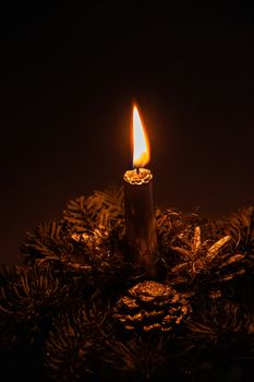 beautiful elegant Christmas headdress with a candle lit in the ambient lighting