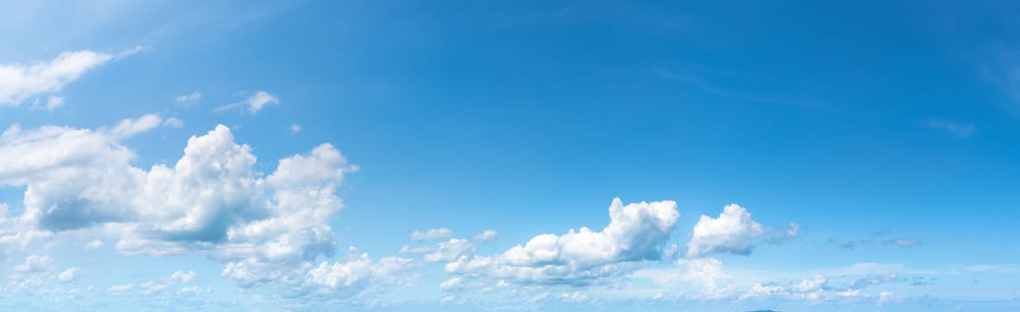 Soft white clouds against blue sky ,Panoramic fluffy clouds in the blue sky