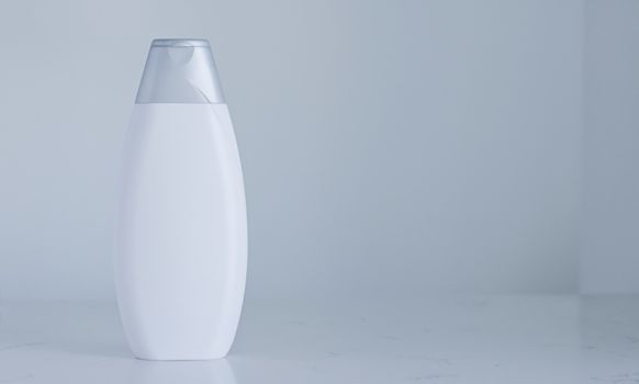 Blank label cosmetic container bottle as product mockup on gray background, hygiene and healthcare