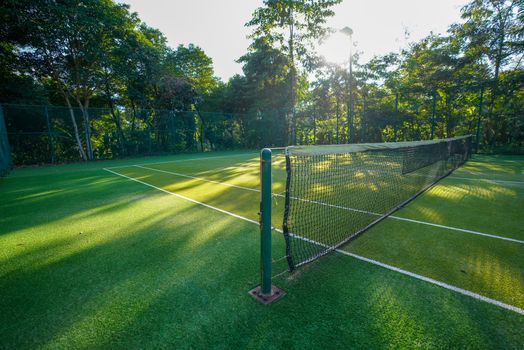 Beautiful scenery View of artificial grass tennis court.