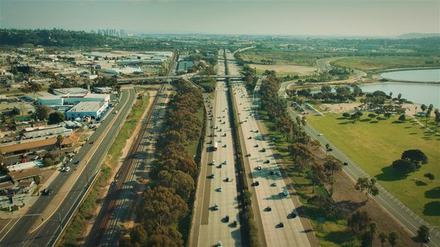 Aerial Flying over Freeway in California. Highway aerial View.