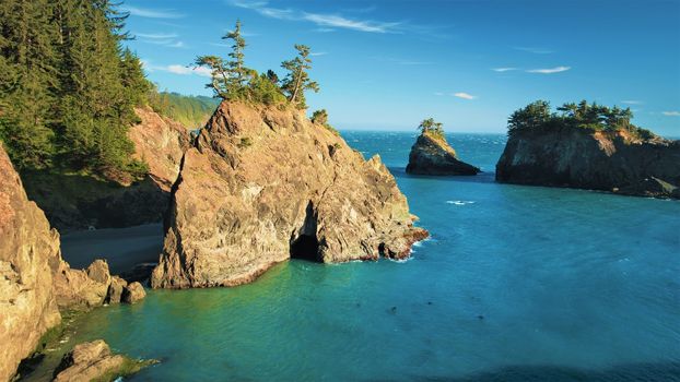 Aerial view over rock sea stacks along the Oregon Pacific North West Coastline.