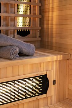 Home sauna with towels prepared in a vacation rental accommodation.