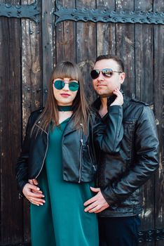 happy guy and girl walking along the tourist streets of old Europe in the city of Gdansk