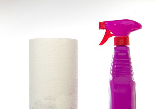 Cleaning supplies on white background like paper roll and ink spray