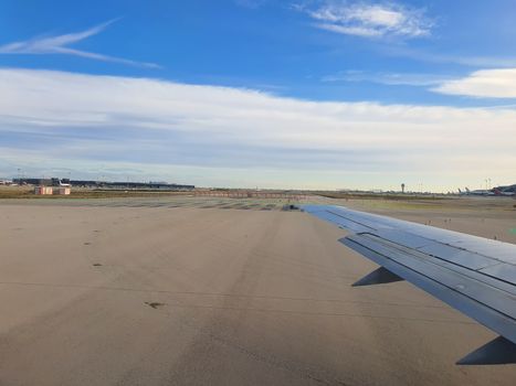 Airplane wing and Barcelona airport, El Prat