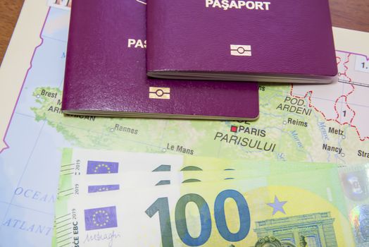 Biometric passport and euro currency on France map