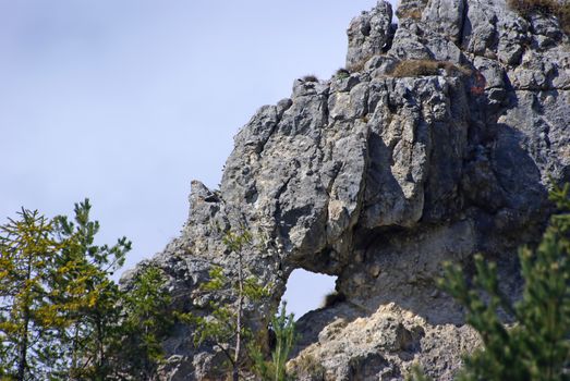 Natural rock hole in the mountain