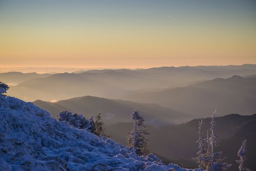 Mountain sunrise scene in winter, Romanian Carpathians landscape