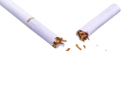 Isolated broken cigarette over white, no smoking campaign