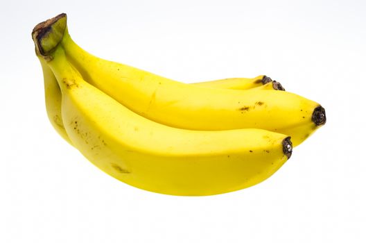 Yellow banana fruits isolated over a white background
