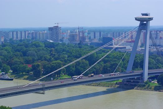 Bratislava skyline and SNP bridge over Danube river, known as UFO bridge