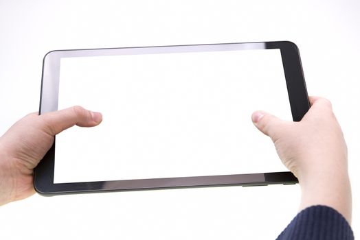 Tablet with white screen in boy hands over a white background