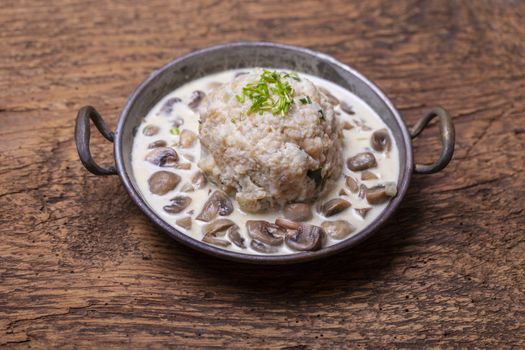 bavarian dumpling in mushroom sauce