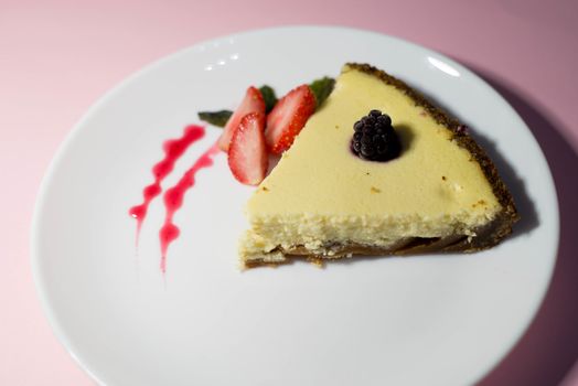 A piece of cheesecake on a white plate