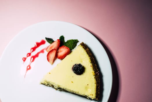 A piece of cheesecake on a white plate