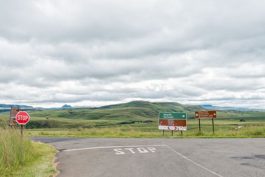 Junction between roads D119 and D475 near Bonjaneni in Kwazulu-Natal. A stop sign and directional signs are visible