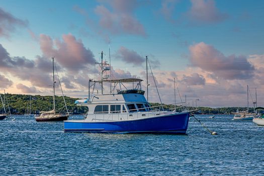 Small fishing boats in a calm New England bay