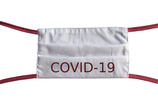 The picture shows a face mask with the text covid-19