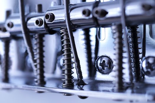 Holding string guitar tuning keys macro closeup. Musician lifestyle instrument backdrop. Music instruments background.