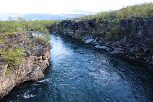 Overview of Kungsleden river in the arctic tundra. Abisko national park, Nothern Sweden