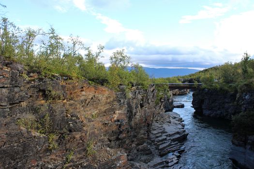 Overview of Kungsleden river in the arctic tundra. Abisko national park, Nothern Sweden